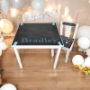 geboorte stoeltje met tafel