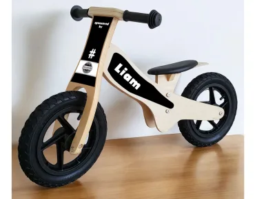 houten loopfiets bedrijfslogo